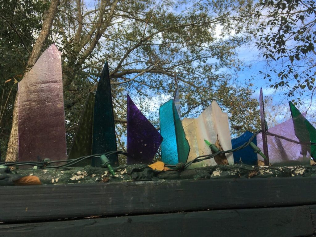 Art glass burglar deterrent on garden wall