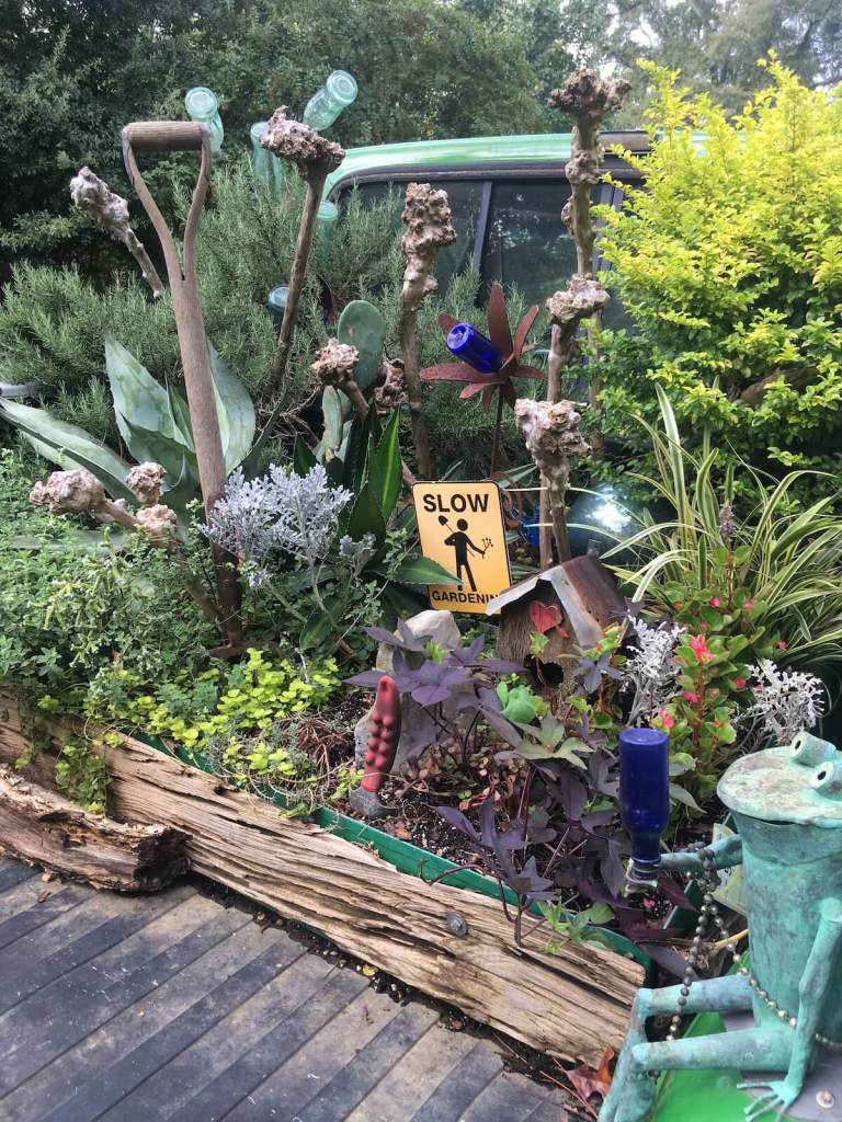 Felder Rushing's truck garden bottle tree sconces