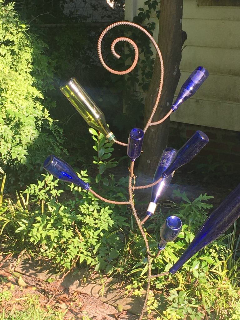 Bottle tree with spiral top